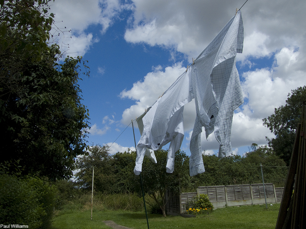 clothes hanging on clothesline in the breeze