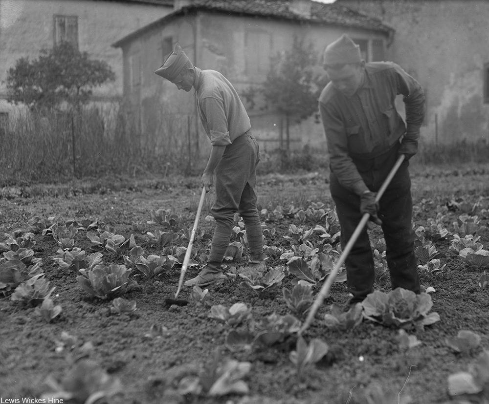 WWI soldiers tending a garden in a convalescent home