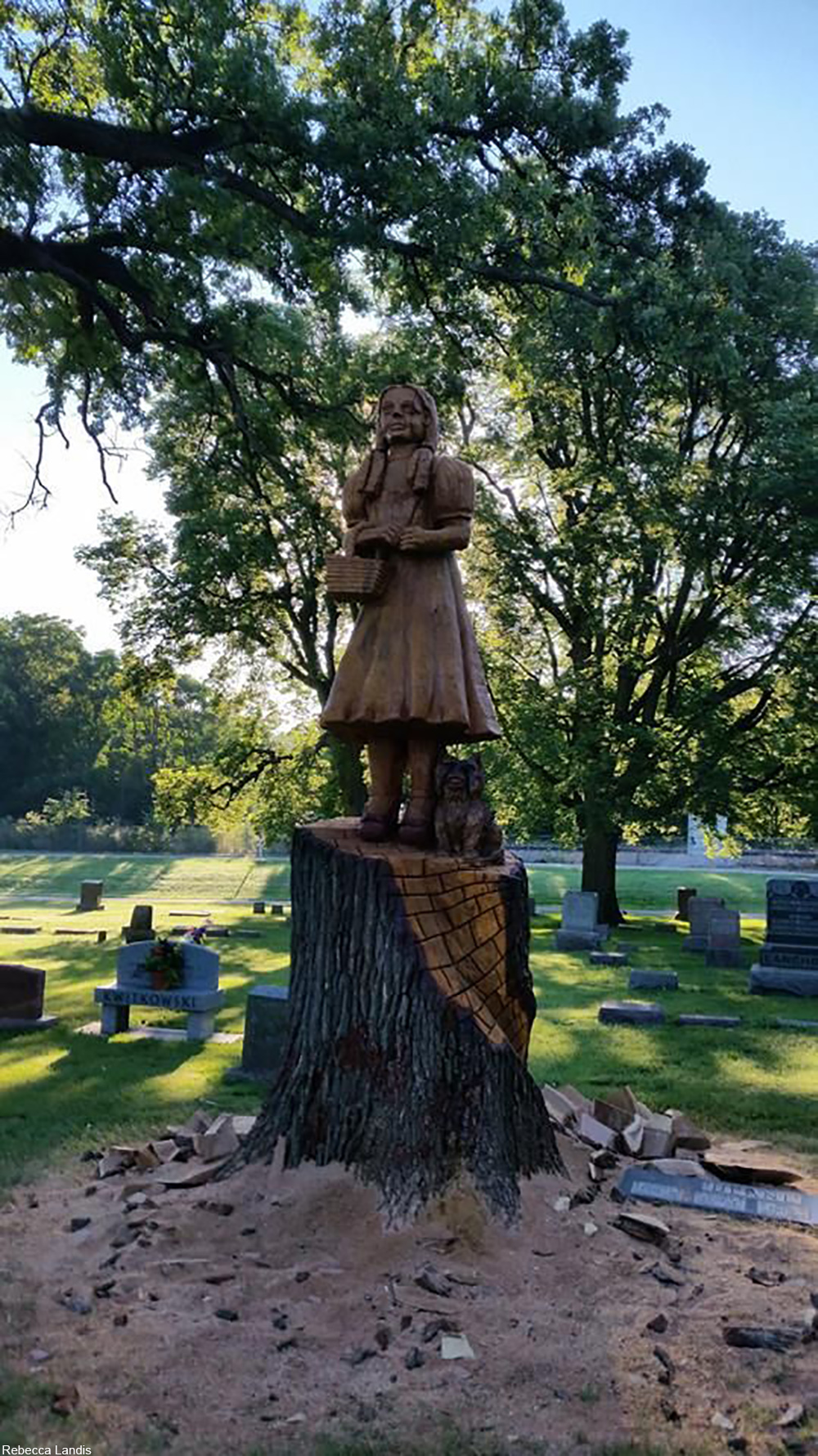 wooden Dorothy Gale statue at the grave of Dorothy Gage, the character's namesake