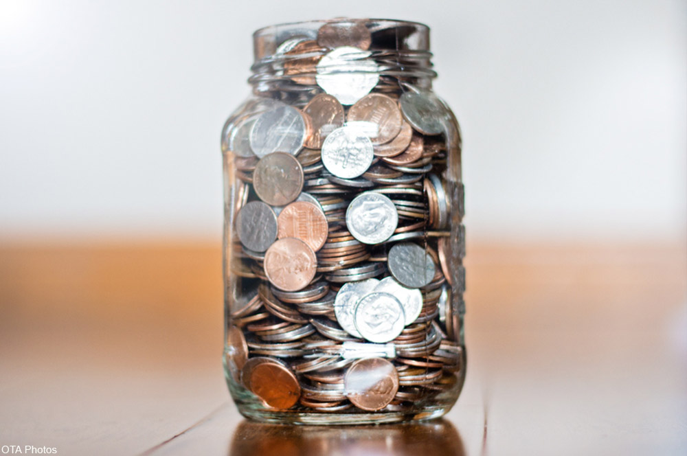 glass jar full of coins