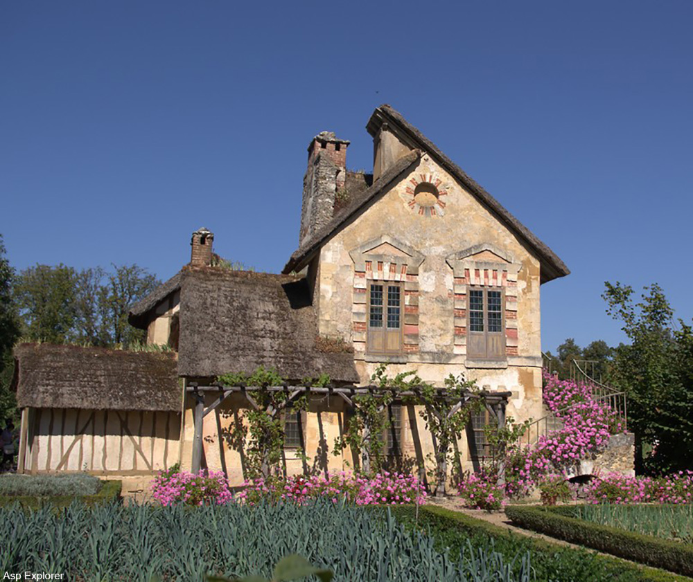 One of quaint buildings of Le Hameau de la Reine.