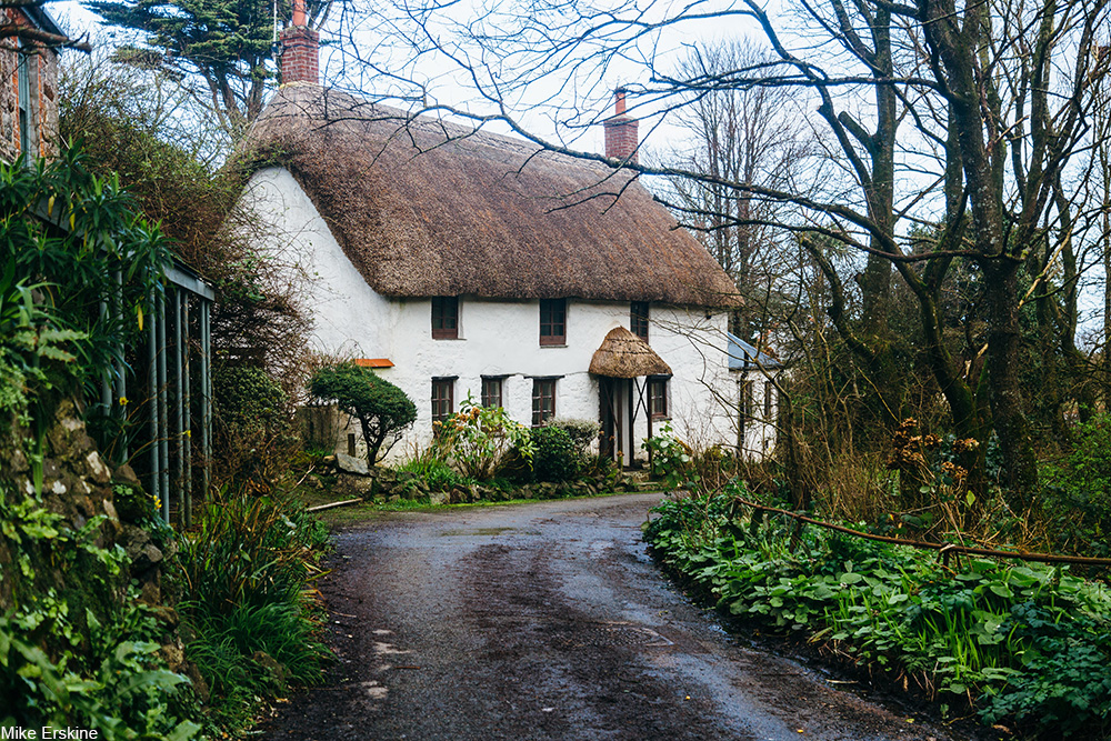 thatched roof cottage in Cornwall, UK