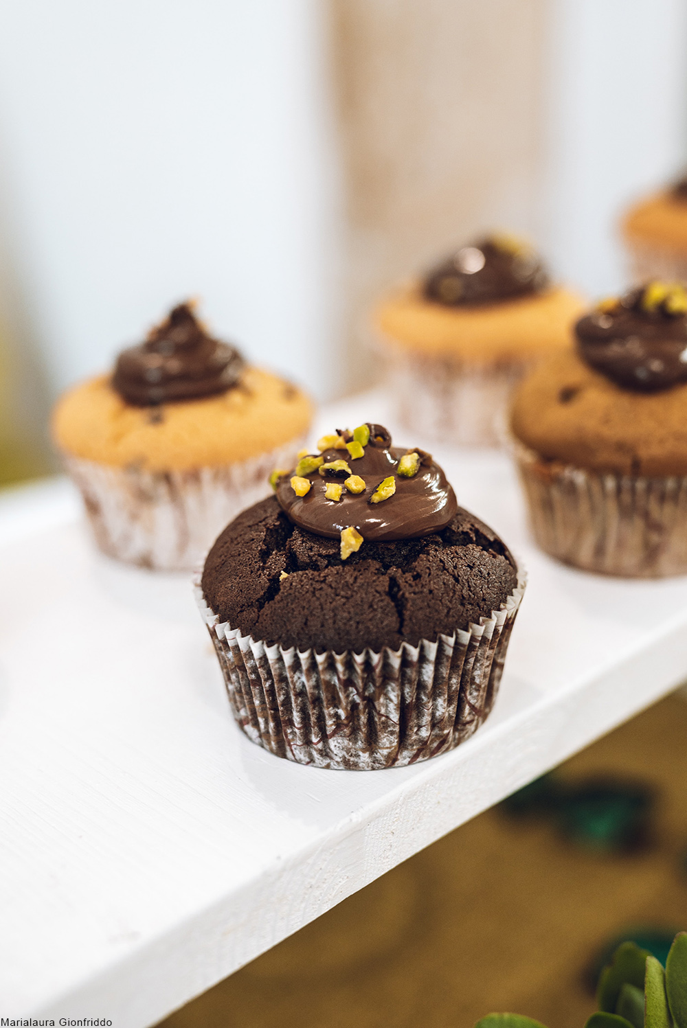 variety of cupcakes on a white background