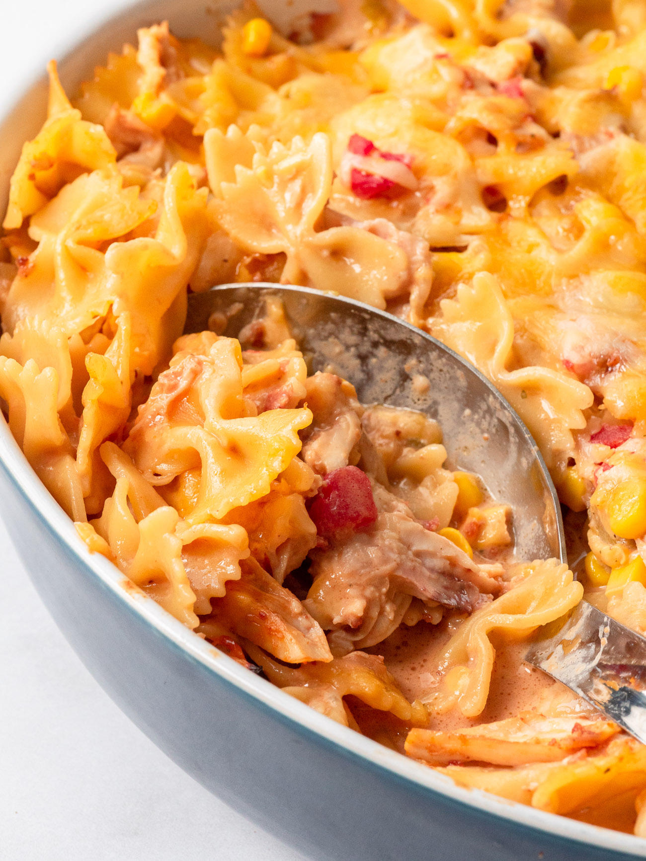 BBQ Ranch Chicken casserole in a dish with a spoon