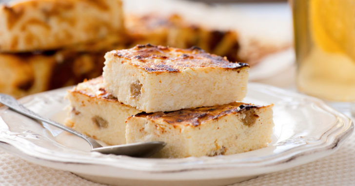 Plate with creamy bars stacked on top of each other.